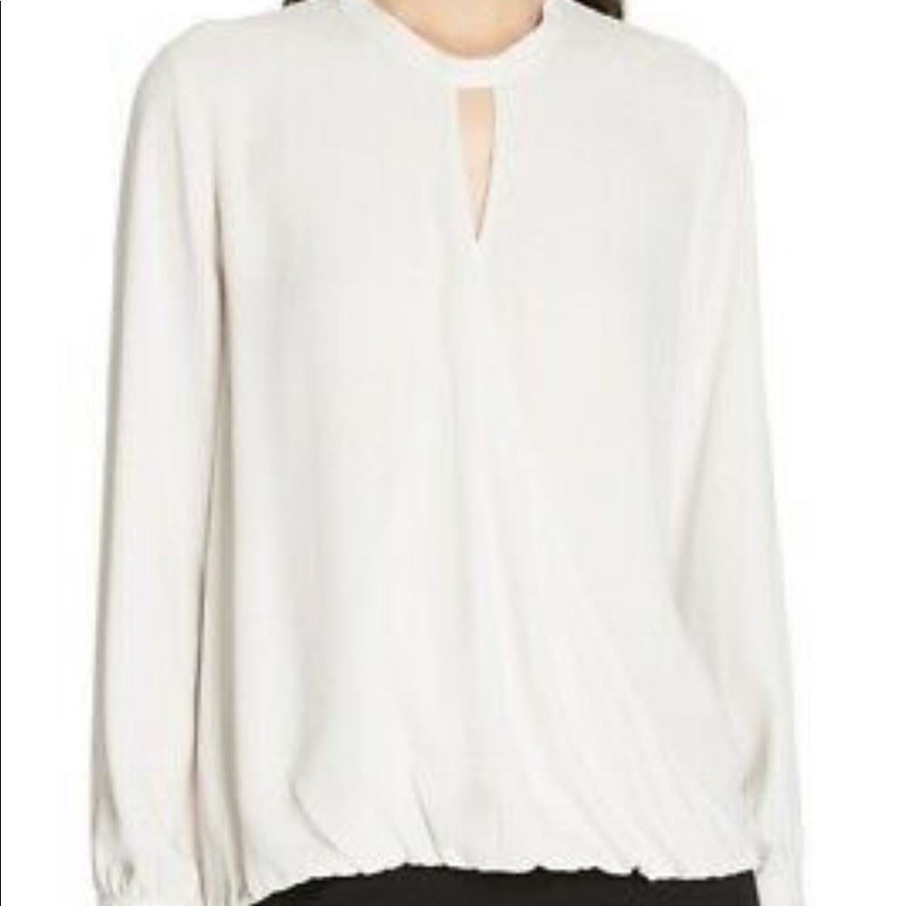 Eileen Fisher cream silk crossover blouse